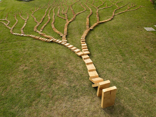 http://www.thisiscolossal.com/2013/01/a-wooden-domino-tree-by-qiu-zhijie/