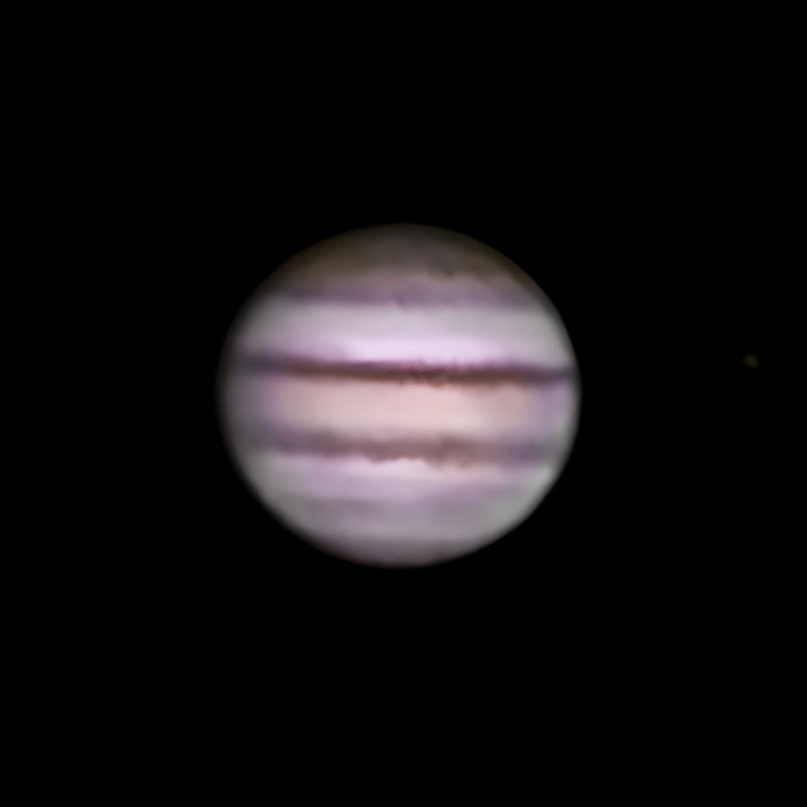 Так выглядит Юпитер через окуляр телескопа.