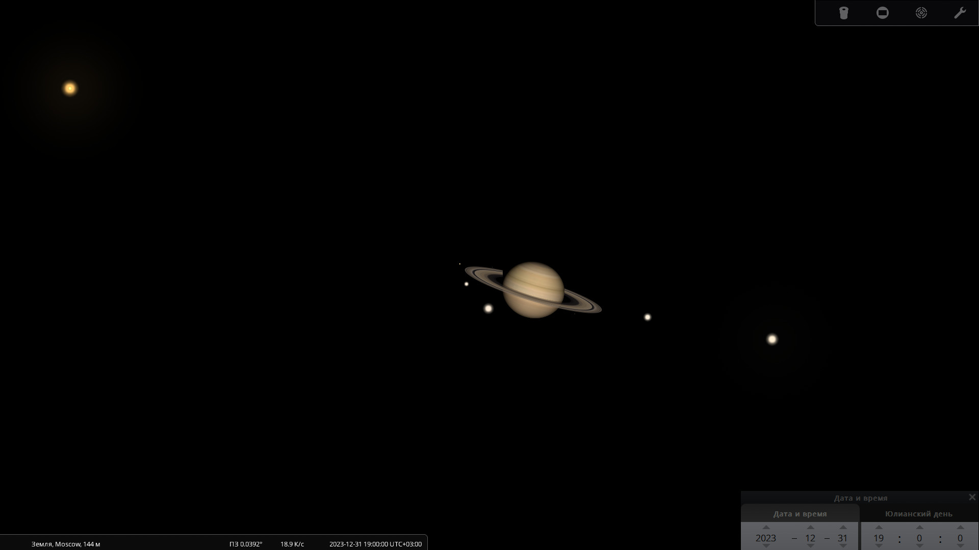 Планета Сатурн и ее крупнейшие спутники — вид в телескоп при большом увеличении  