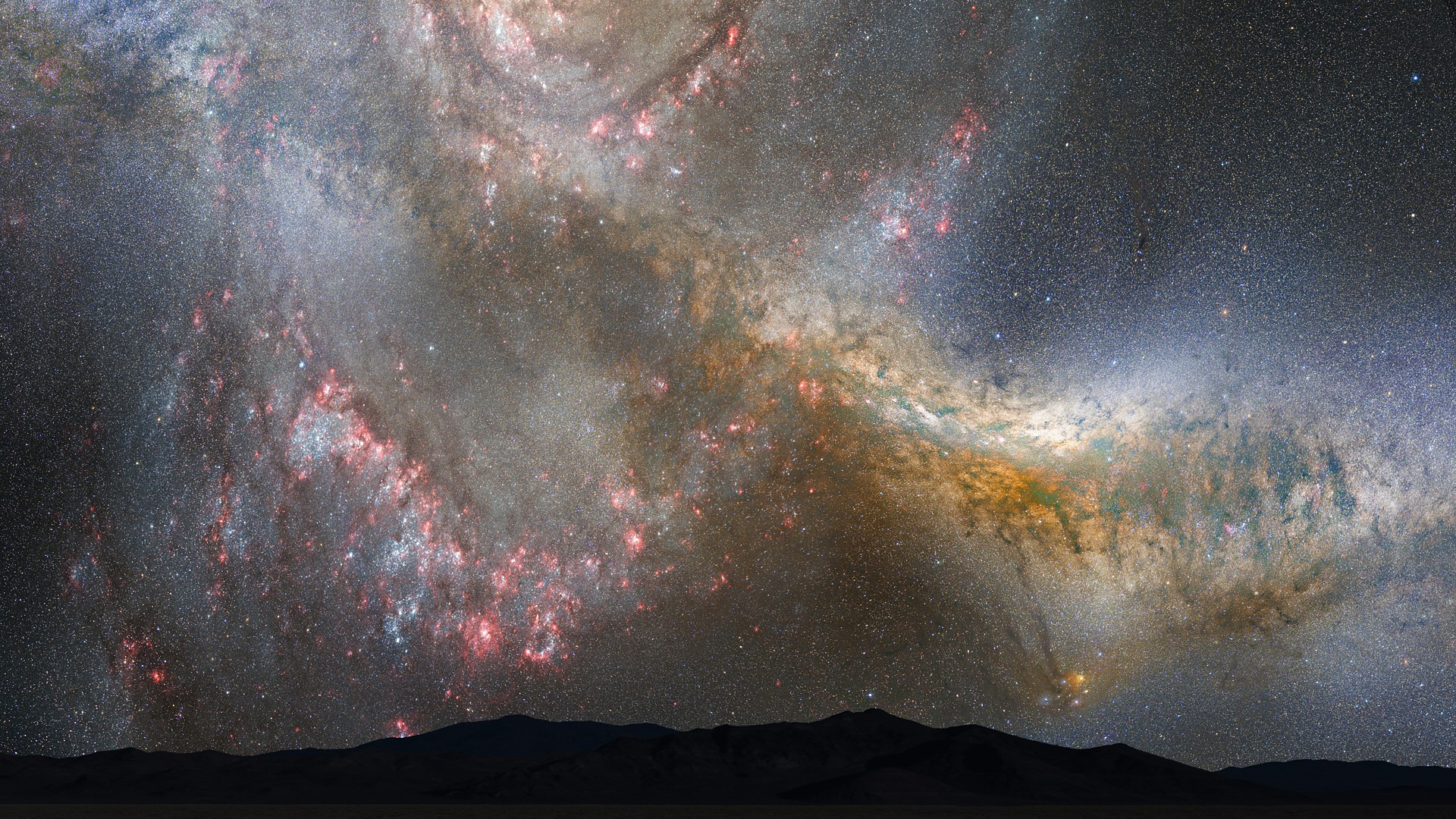 Активная фаза слияния галактик Андромеды и Млечного пути. Вид с одной из планет — уже не важно, какой из галактик, через три или четыре миллиарда лет. Рисунок художника  