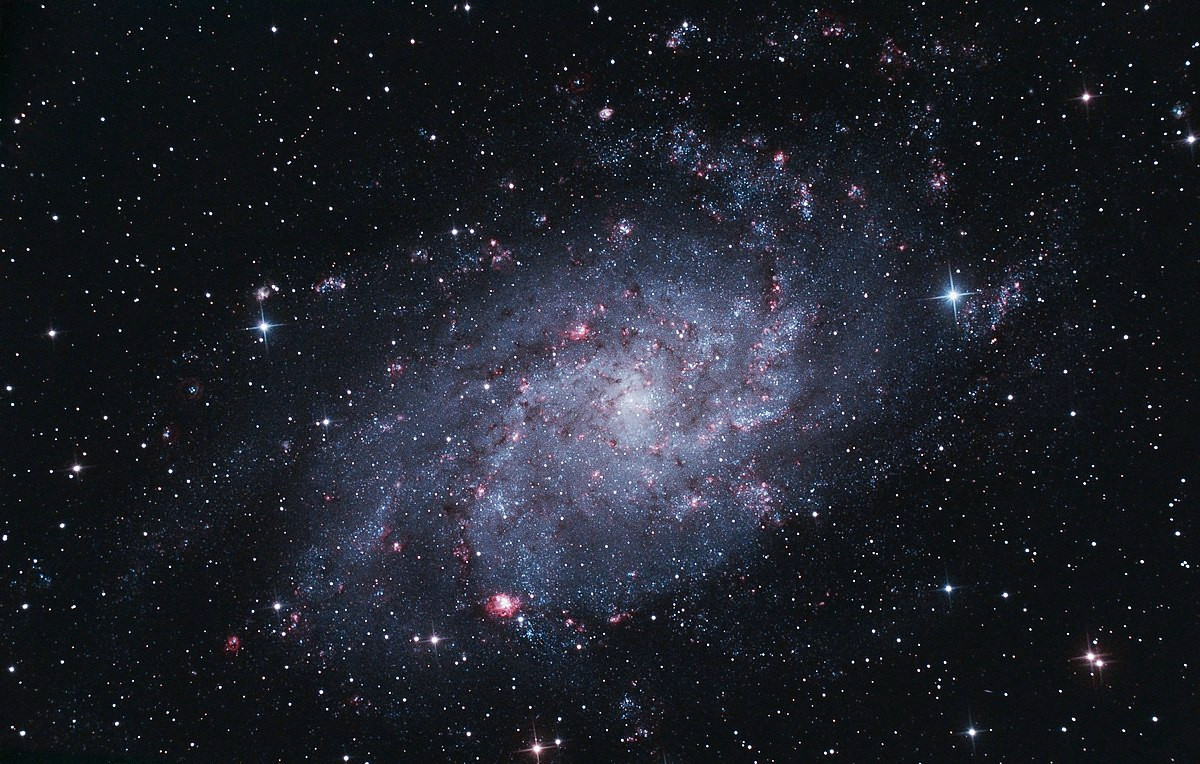 Спиральная галактика М33 в созвездии Треугольника  