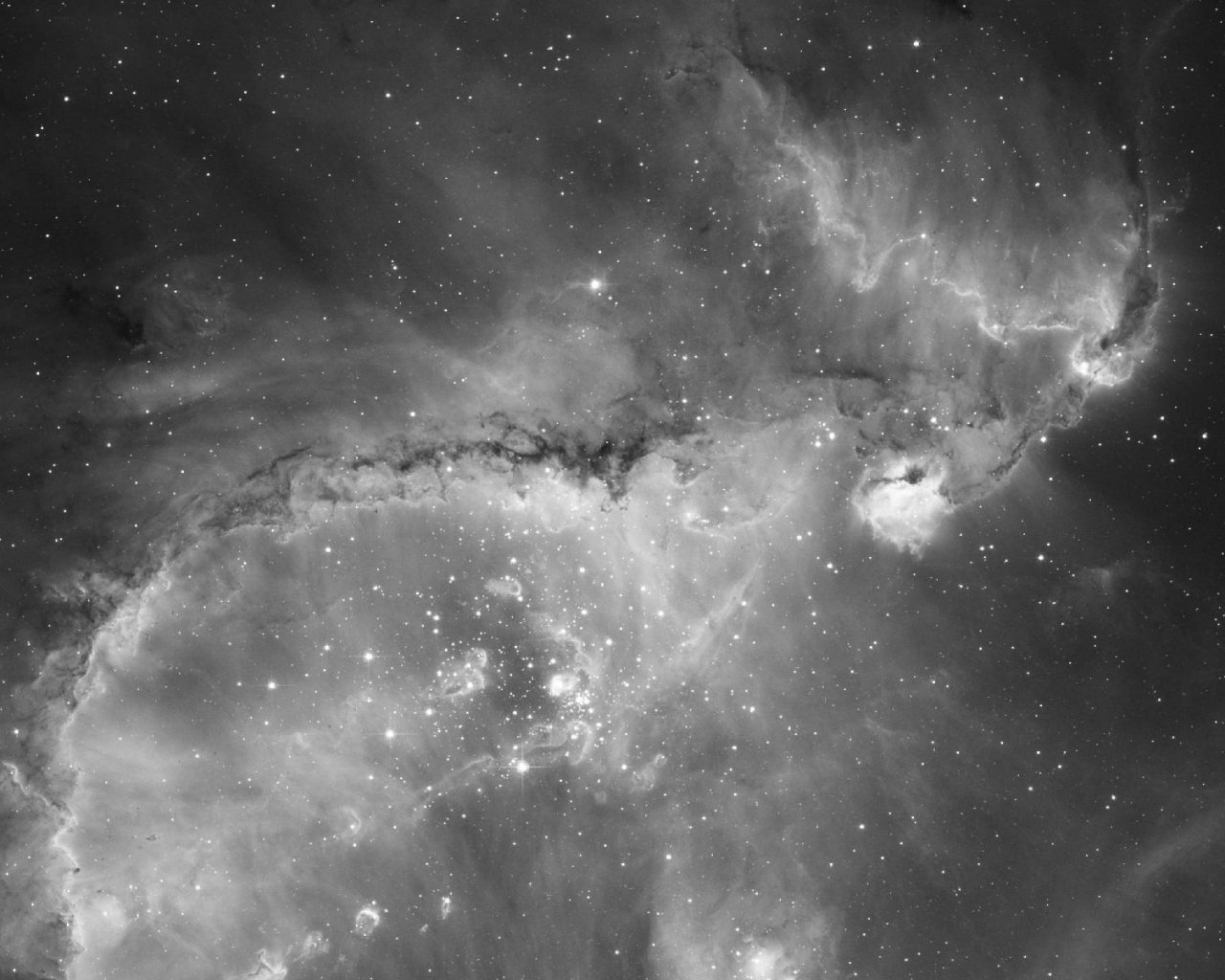 Скопление звезд NGC 346 в соседней галактике, Малом Магеллановом облаке, распространяет сильное излучение, которое воздействует на окружающий газ и заставляет его светиться