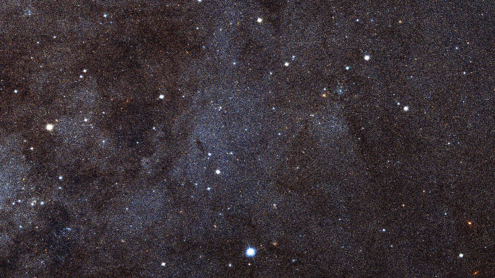 Разделенные на отдельные звёзды периферийные области спиральных ветвей галактики Андромеды. Снимок космического телескопа имени Эдвина Хаббла  