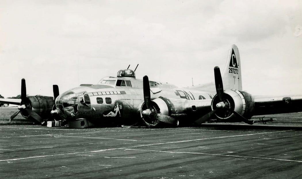 Crashed B-17 on runway.
